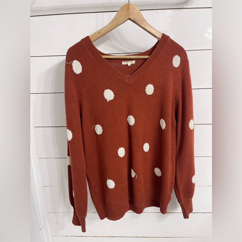 Size L sweater. Burnt Orange with white polka dots